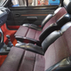 The ‘new’ front seats (rears are similar), in the condition I found them on the junkyard. With subtle enough leather, but with ripped cloth in one spot and broken seams. Here they are mounted in my car already, as a test.
